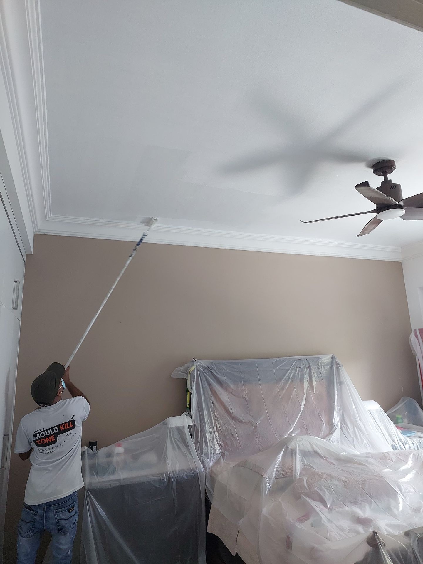 Pico X Health crew completing a large ceiling repaint in Singapore